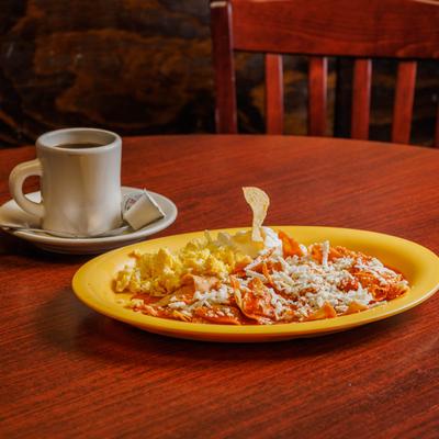 Mexican breakfast with tortilla chips simmered in sauce