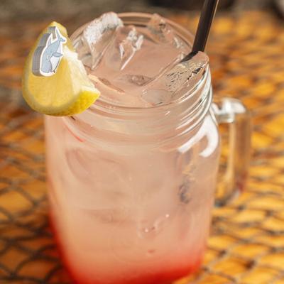 Shark Bite cocktail, with vodka, strawberry puree and frozen lemonade.
