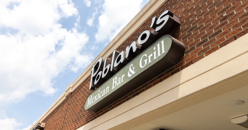 Exterior, sign above entrance