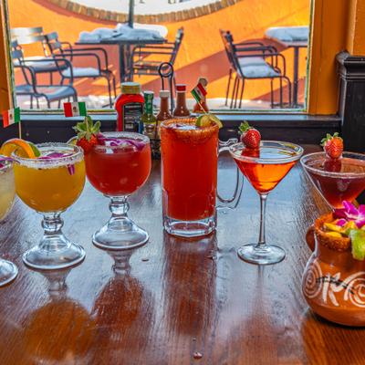 All prepared drinks displayed on a wooden table.