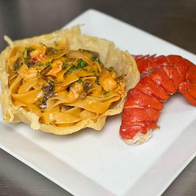 Lobster tail and pasta.