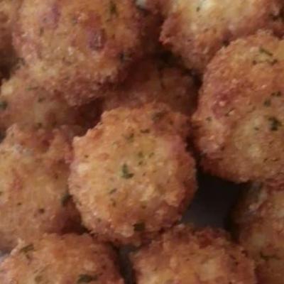 Close-up view of crispy fried bites.