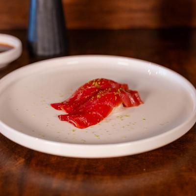 Soy-marinated tuna nigiri.