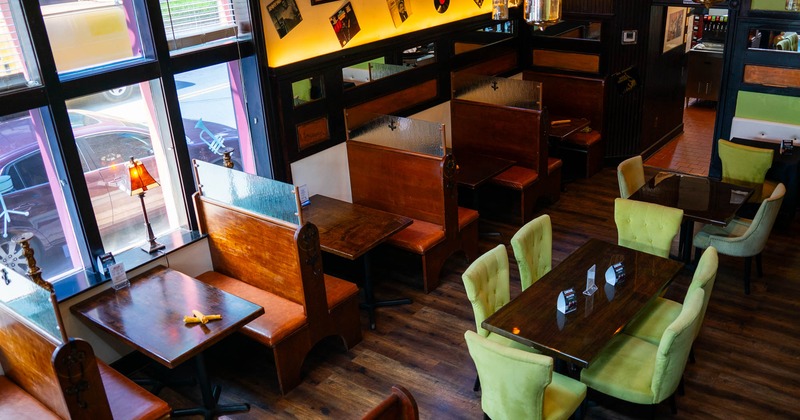 Top view of a dining area, booths, tables and chairs