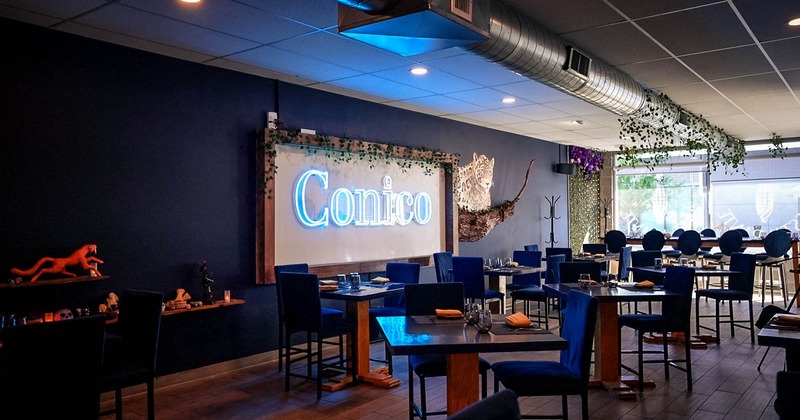 Interior, dining area, large ''Conico'' logo sign, large shop window, tile flooring