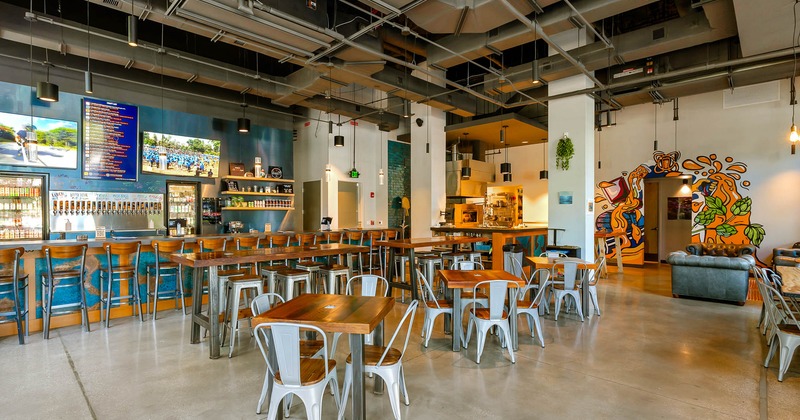 Big dining area, tables and chairs ready for guests