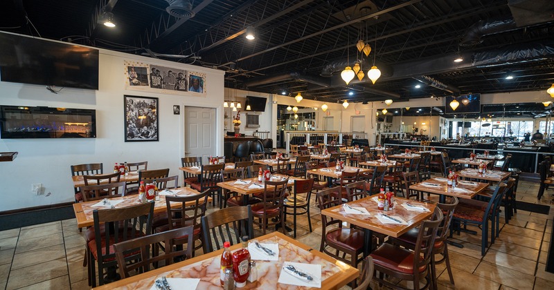 Interior dining area with set dining tables ready for guests
