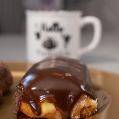 Boston Creampie glazzed with chocolate, close-up.