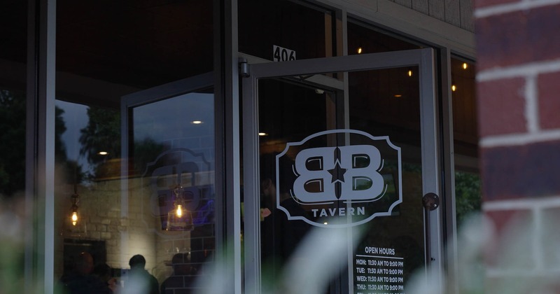 Exterior, entance and a neon sign