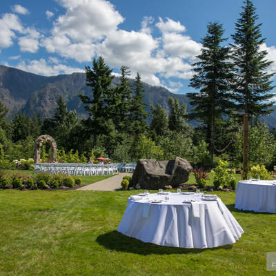 Table and wedding arch in restaurant garden