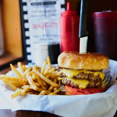 Triple cheeseburger, with fries.