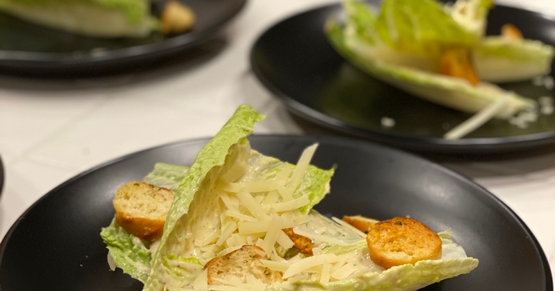 Caesar salad plates served