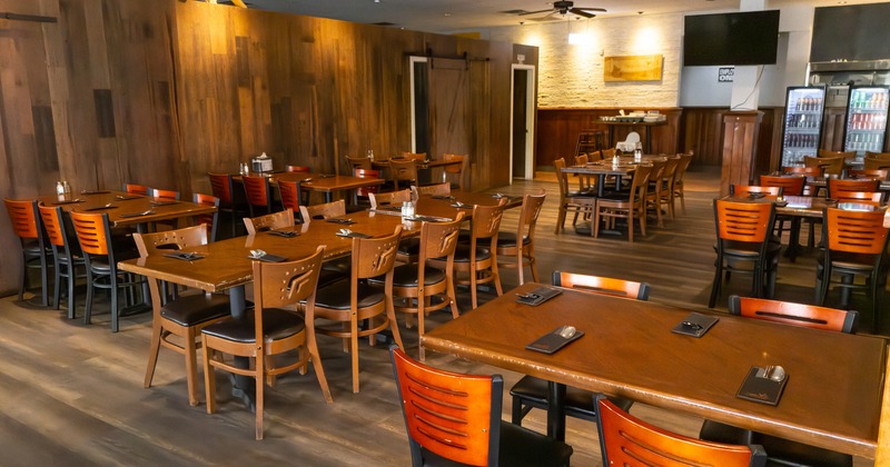 Interior space, dining area with tables ready for guests