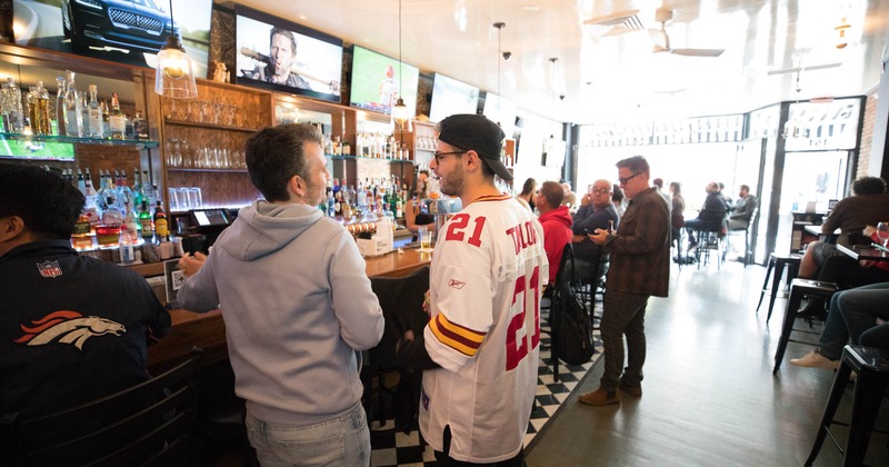 Interior, guests in the bar area