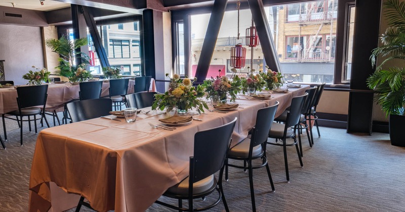 Interior, tables and chairs in dining area