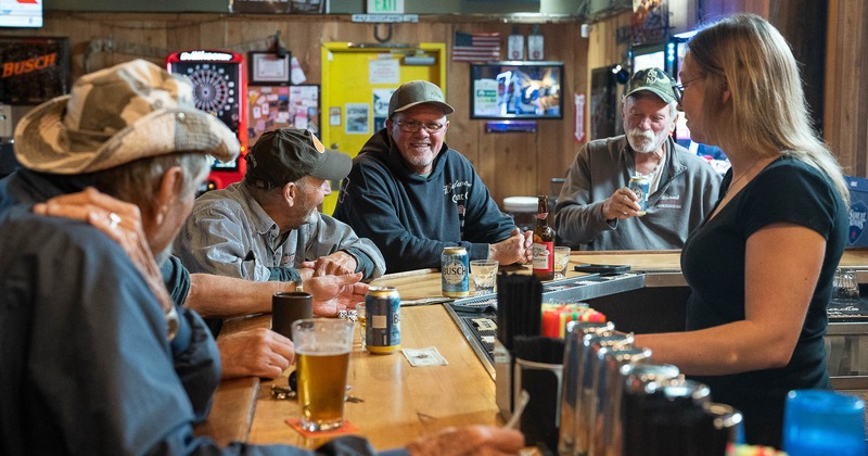 Customers sitting at the bar