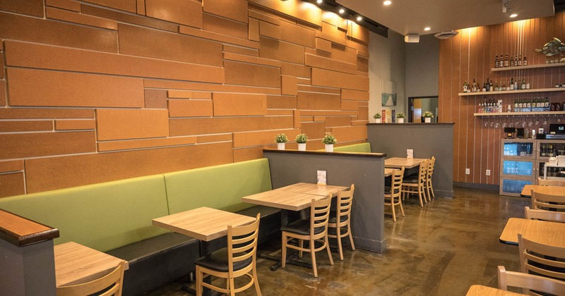 Interior, dining area with bench, chairs and tables