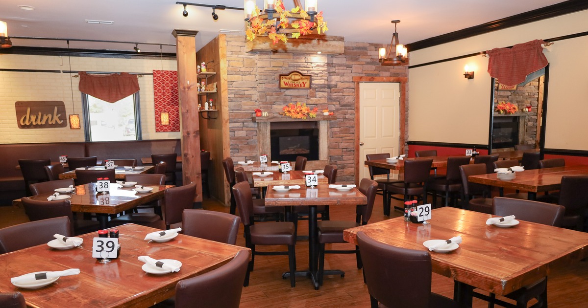 Cozy interior dining area with set tables ready for guests