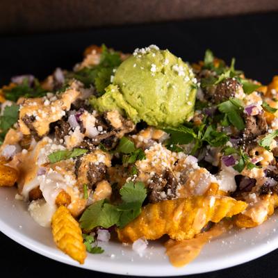 A plate of Carne Asada fries.