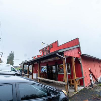 Side view at the entrance with a sign above it.
