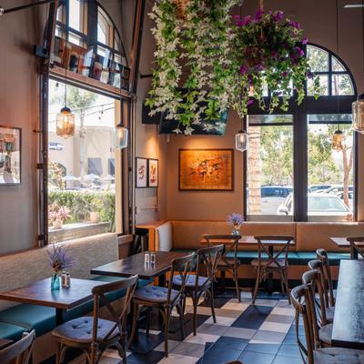 The restaurant's interior, tables and chairs.