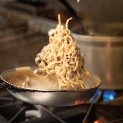 Food being prepared in a pan.