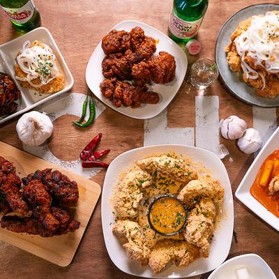 Various dished and drinks on a table.