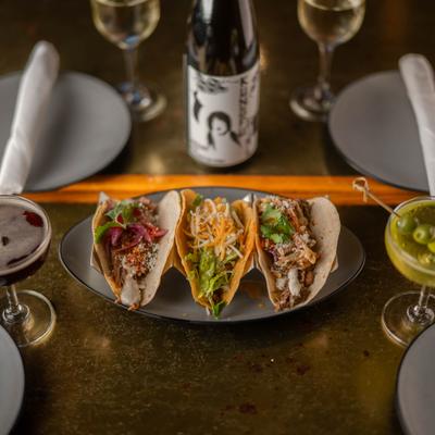 Served taco trio on the table.