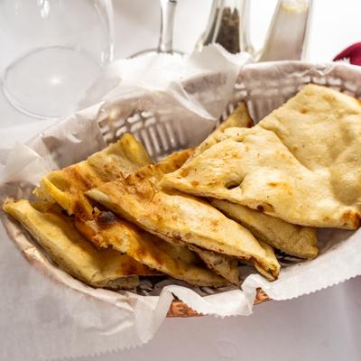 A basket of tandoori butter naan.