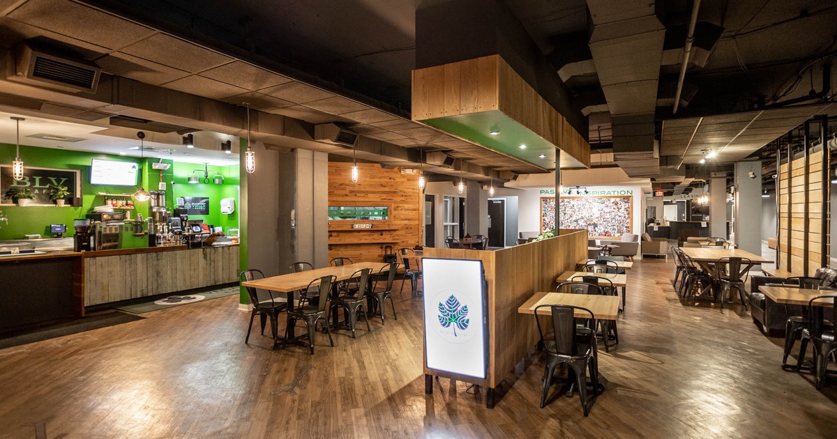 Dining area and bar in the background