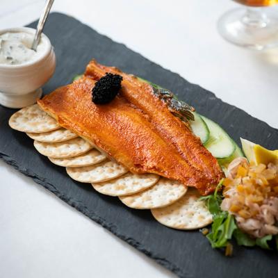 Smoke trout fillet, with crackers and tartar sauce