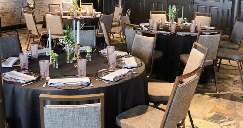 Interior, dining area with tables set for an event
