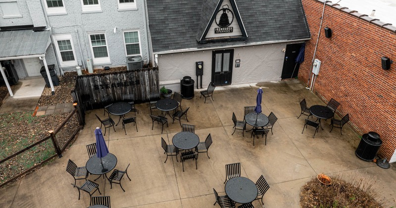 Exterior, patio seating area, tables and chairs