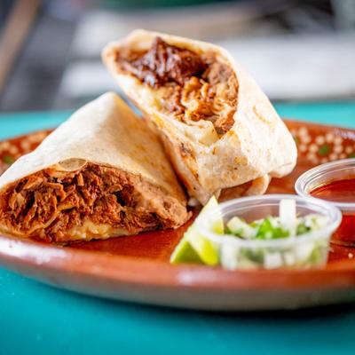 A burrito cut in half.