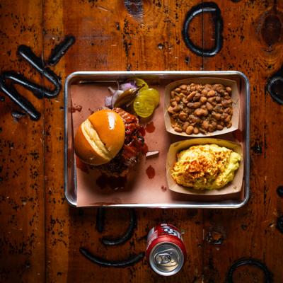 1 Meat Sandwich Combo with sides of baked beans and potato salad.