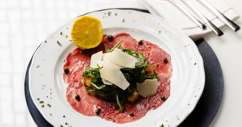 Beef carpaccio with arugula and parmesan