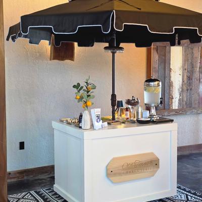 A picture of a mobile charcuterie cart.