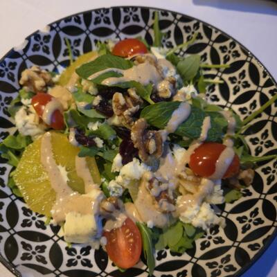 Mixed salad with cheese.