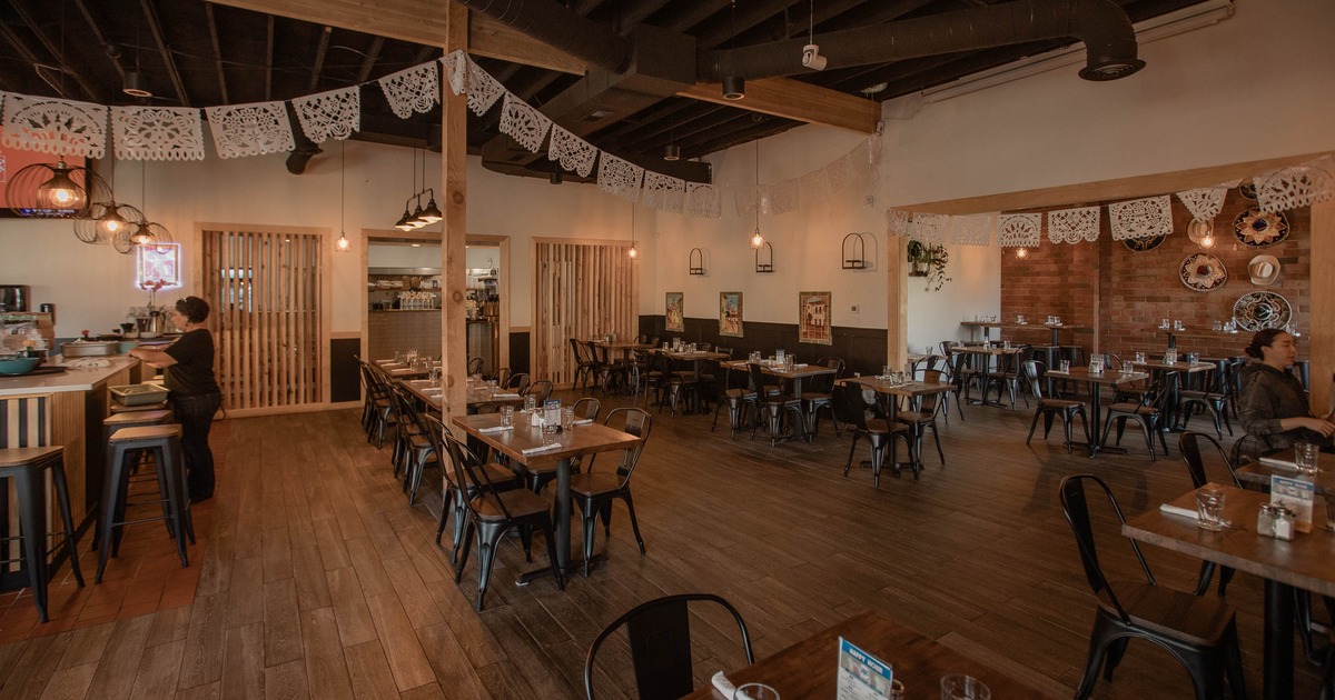 Interior, tables and chairs in dining area