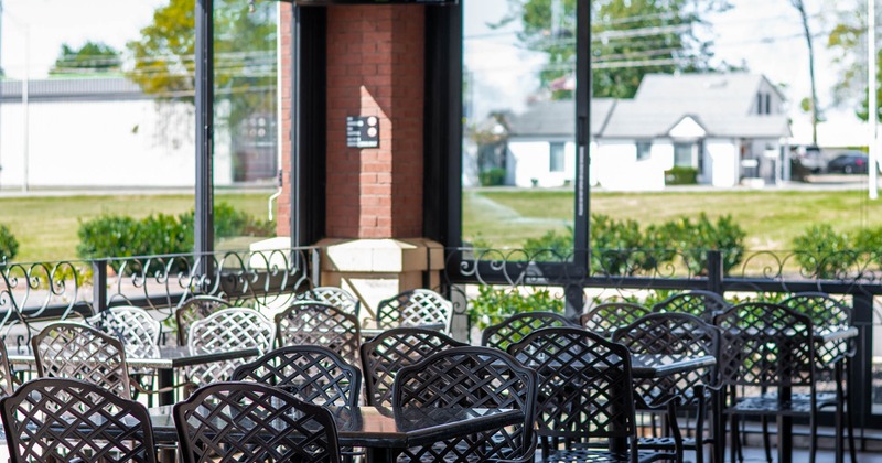 Interior, seating area, tables and seats ready for guests