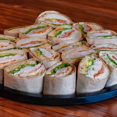 Chicken sandwiches on a tray.
