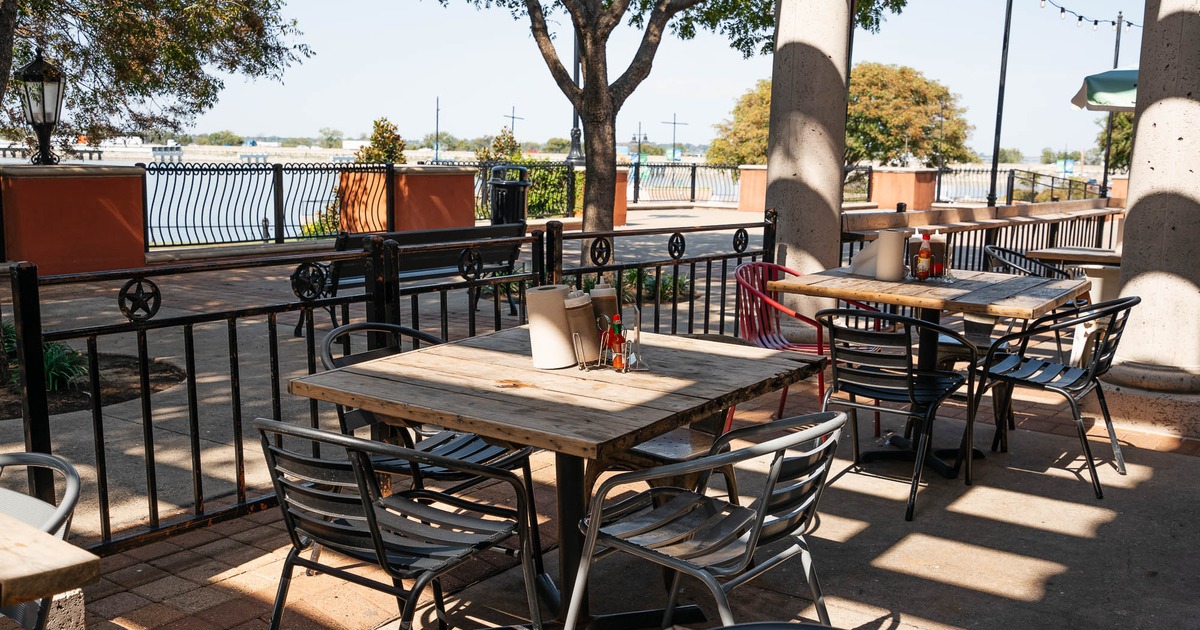 Outdoor patio area, tables and chairs