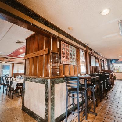 Interior with high and regular seating.