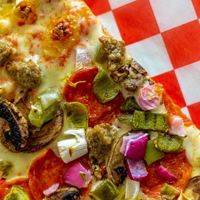 Closeup of the Works Pizza topping