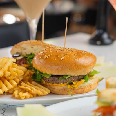 Cheeseburger and waffle fries.