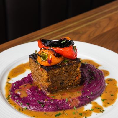 Meatloaf, with purple sweet potato puree, and roasted peppers