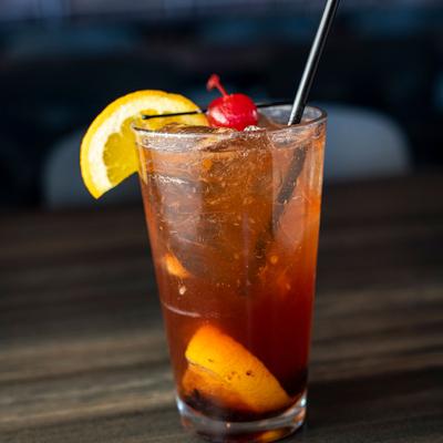 A glass of Old Fashioned cocktail