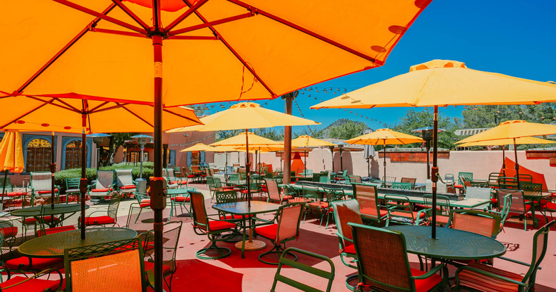 Patio, parasols, tables and chairs