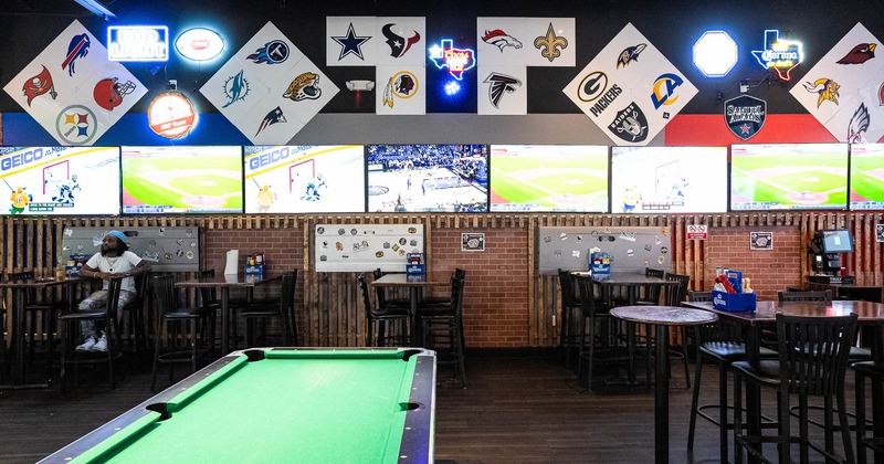 Interior, pool table with seating place behind