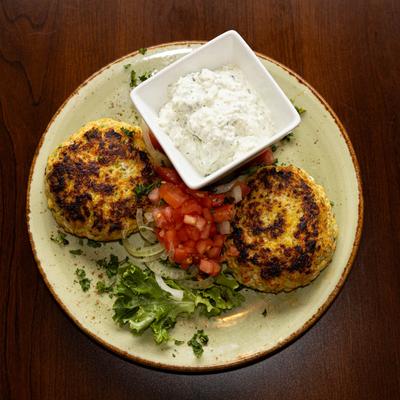 Chicken Meatballs, served with veggies, and tzatziki.